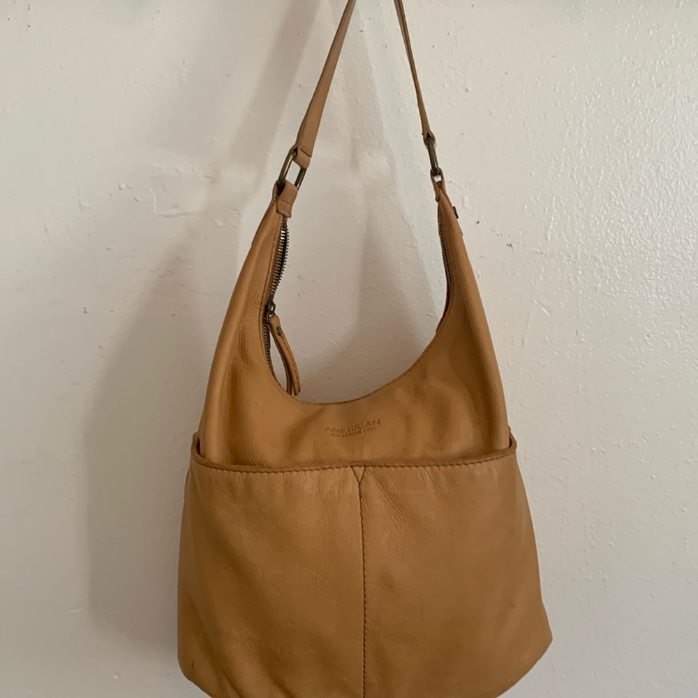 American leather beige color real leather bag two front pockets beautiful